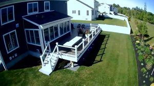 birds eye view of custom deck build in cohasset showing the stairs